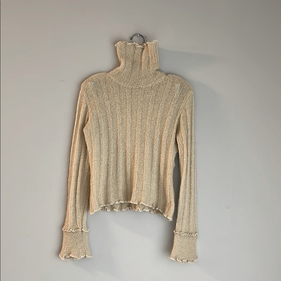 Marc Aurel cream turtleneck sweater
Size 36 - Picture 1 of 5